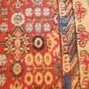 small antique red background khotan rug 49033 design Nazmiyal