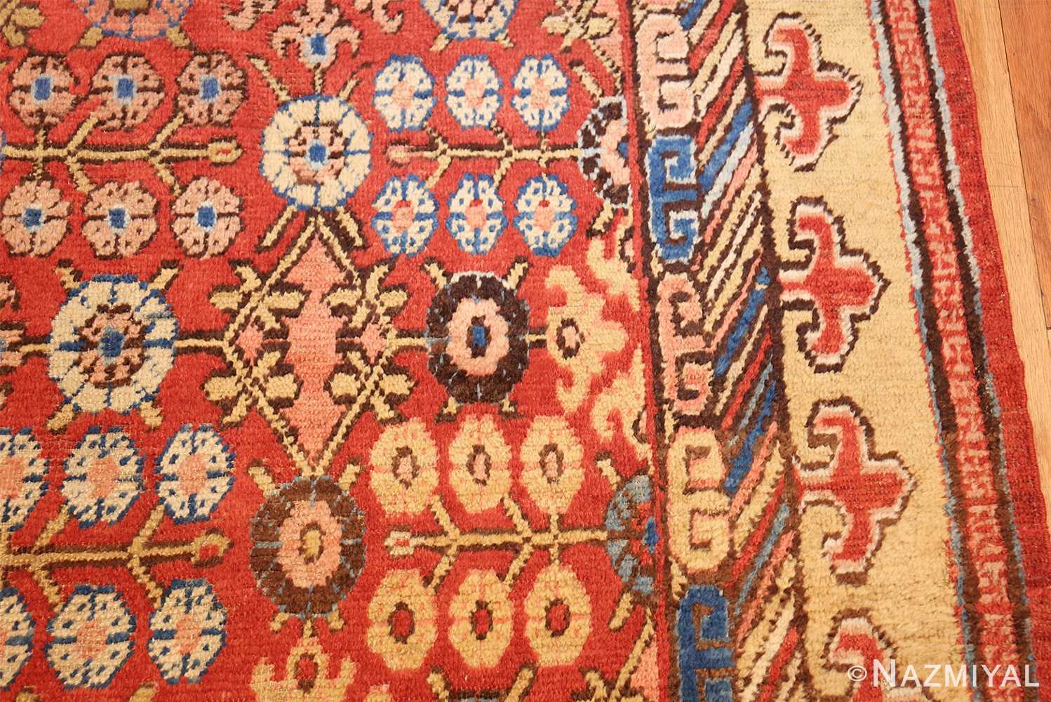 small antique red background khotan rug 49033 design Nazmiyal