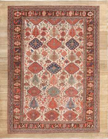 ivory background tribal antique Persian Bakshaish rug 49508 by Nazmiyal