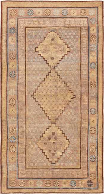Small Earth Tone Tribal Animal Pelt Antique Khotan Rug #49977 Nazmiyal