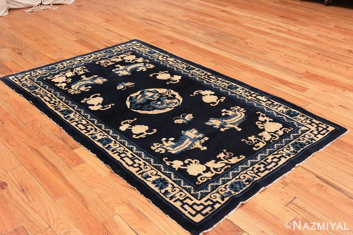 Image of Small Antique Peking Foo Dog Chinese Rug #70039 from the collection of Nazmiyal Antique Rugs NYC