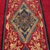 Picture of the central medallion design of the red Medallion Design Antique American Hooked Rug #70059 from Nazmiyal Antique Rugs in NYC