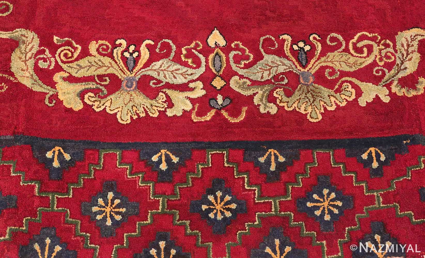 Picture of the border of the red Medallion Design Antique American Hooked Rug #70059 from Nazmiyal Antique Rugs in NYC