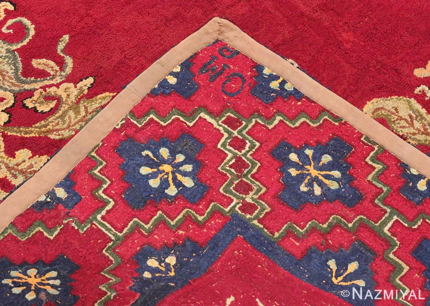 Picture of the Weave of red Medallion Design Antique American Hooked Rug #70059 from Nazmiyal Antique Rugs in NYC