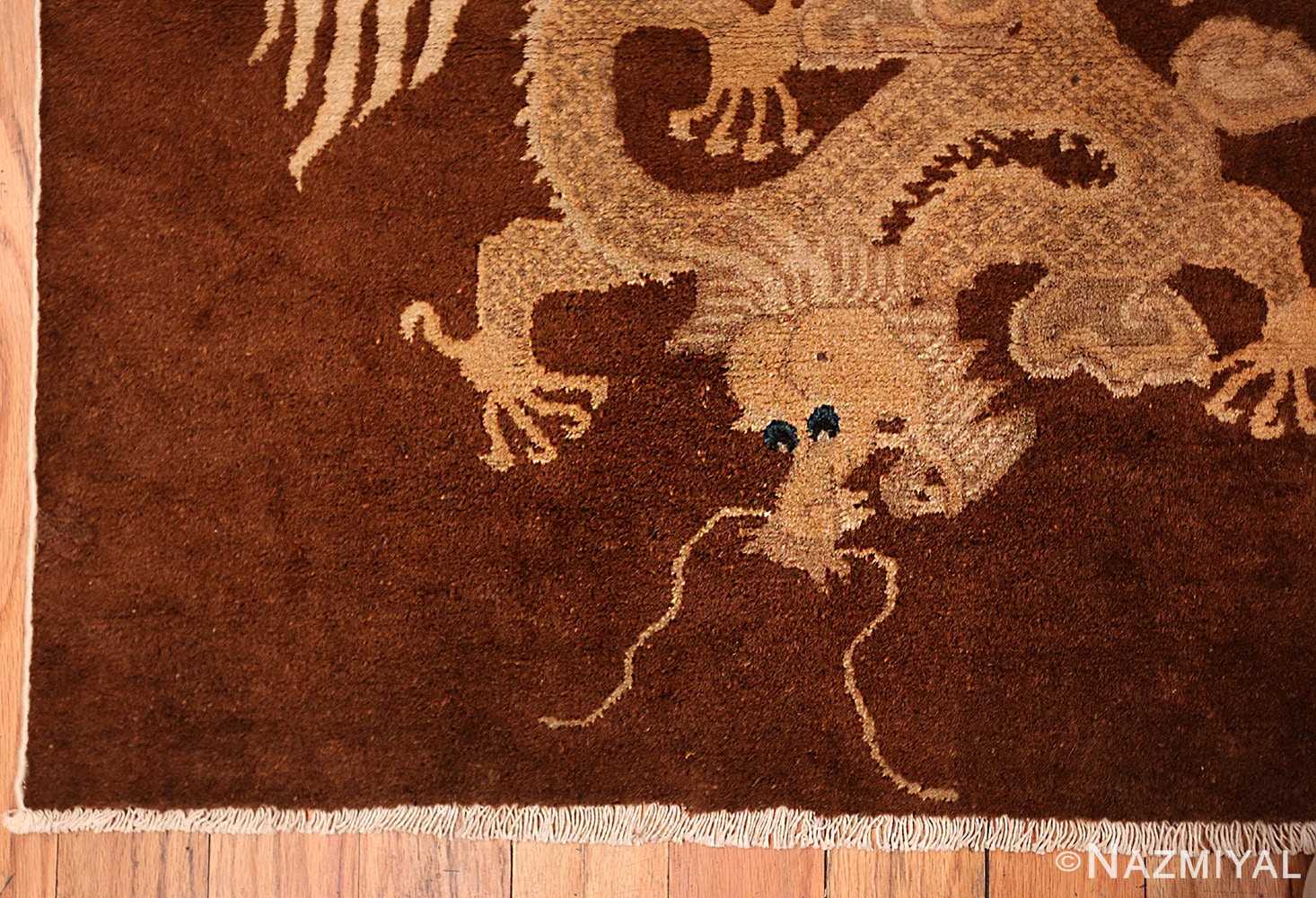 A detailed dragon piture of the antique chinese dragon runner rug #70064 from Nazmiyal Antique Rugs NYC