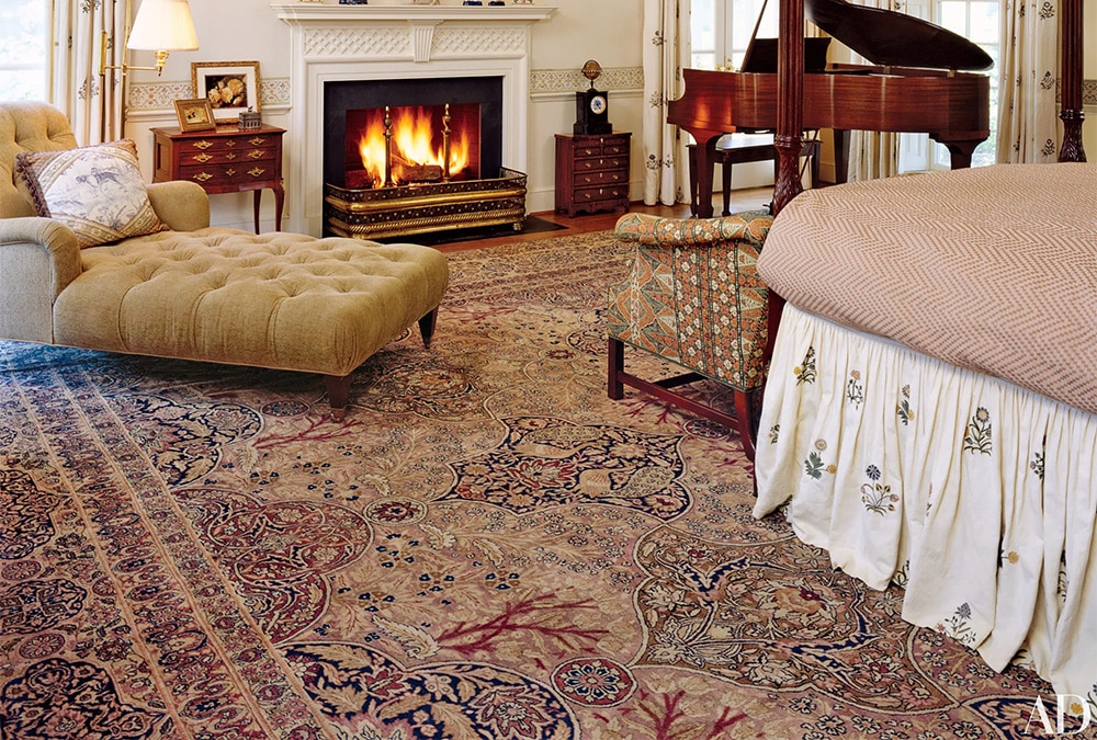 Sleek Bedroom Interior With Antique Persian Kerman Rug by Nazmiyal Antique Rugs