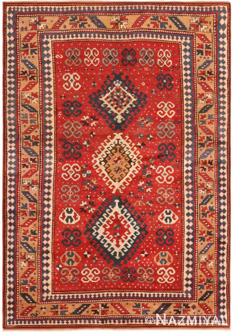 Red Background Antique Caucasian Kazak Tribal Rug 71220 by Nazmiyal Antique Rug