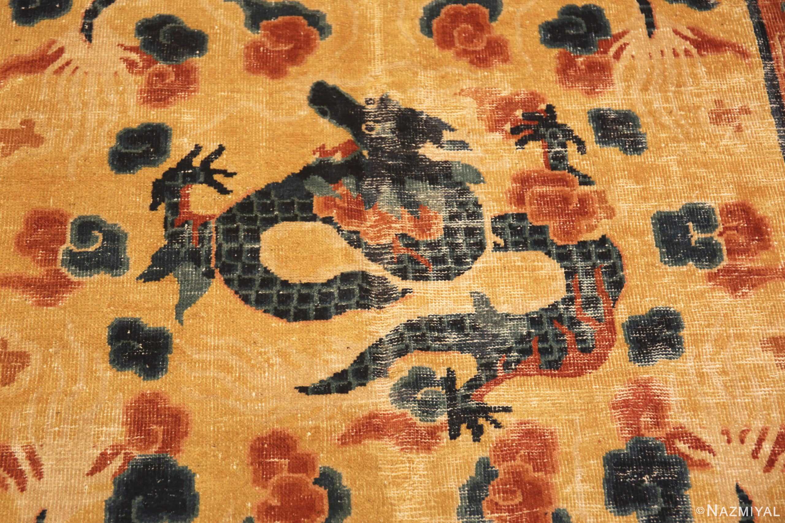 https://cdn.nazmiyalantiquerugs.com/wp-content/uploads/2023/02/watermark/detail-antique-chinese-dragon-design-rug-72102-nazmiyal.jpg