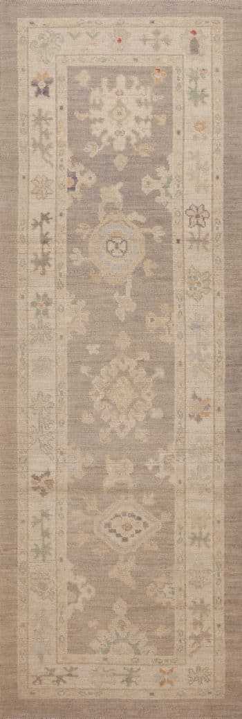 A Warm and Cozy Soft Neutral Grey Pastel Color Tribal Geometric Modern Turkish Oushak Design Hallway Runner Rug 11195 by Nazmiyal Antique Rugs